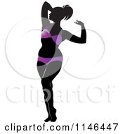 Clipart Of A Silhouetted Woman Strutting In A Purple Bikini Royalty Free Vector Illustration by Lal Perera