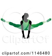 Poster, Art Print Of Silhouetted Gymnast Woman Balancing On Her Hands In A Green Leotard