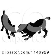 Clipart Of Retro Vintage Silhouetted Dogs Playing Royalty Free Vector Illustration