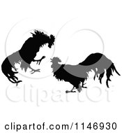 Clipart Of A Retro Vintage Silhouetted Cock Fight Royalty Free Vector Illustration