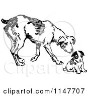 Clipart Of A Retro Vintage Black And White Dog And Puppy Royalty Free Vector Illustration