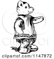 Clipart Of A Retro Vintage Black And White Teddy Bear Pointing Royalty Free Vector Illustration