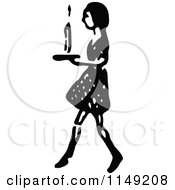 Clipart Of A Retro Vintage Black And White Girl Walking With A Candle Royalty Free Vector Illustration
