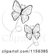Cartoon Clipart Of Black And White Flying Butterflies Vector Outlined Coloring Page