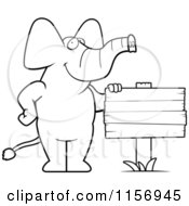 Poster, Art Print Of Black And White Elephant Standing Beside A Blank Wood Sign