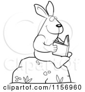 Cartoon Clipart Of A Black And White Rabbit Reading A Book On A Boulder Vector Outlined Coloring Page