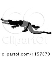 Poster, Art Print Of Silhouetted Crocodile