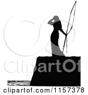 Clipart Of A Silhouetted Woman On A Coastal Cliff Royalty Free Vector Illustration