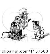 Clipart Of A Retro Vintage Black And White Mother Mouse Talking Royalty Free Vector Illustration