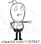 Cartoon Clipart Of A Black And White Alien Pointing Vector Outlined Coloring Page