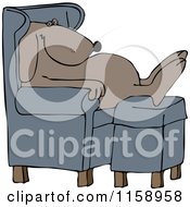 Dog Sleeping In A Chair With His Feet On An Ottoman