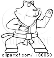 Cartoon Clipart Of A Black And White Karate Cat Vector Outlined Coloring Page