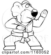 Cartoon Clipart Of A Black And White Karate Koala Vector Outlined Coloring Page