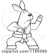 Cartoon Clipart Of A Black And White Karate Rabbit Vector Outlined Coloring Page
