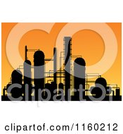 Poster, Art Print Of Chemical Factory Plat Silhouetted Against An Orange Sunset