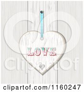 Clipart Of A White Washed Wood Plaque Heart With The Word Love Royalty Free Illustration