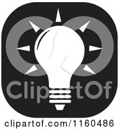 Clipart Of A Black And White Lightbulb Icon Royalty Free Vector Illustration by Johnny Sajem