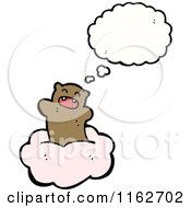 Cartoon Of A Thinking Brown Bear On A Cloud Royalty Free Vector Illustration
