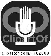 Cartoon Of A Black And White Microphone Icon Royalty Free Vector Clipart