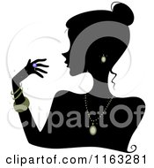 Silhouetted Woman Wearing Jewelery
