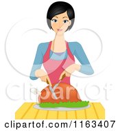 Happy Woman Carving A Roasted Chicken