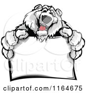 Cartoon Of A Friendly Polar Bear Holding A Sign Royalty Free Vector Clipart