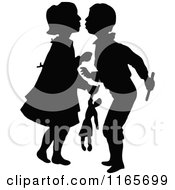 Poster, Art Print Of Silhouetted Children About To Kiss
