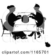 Poster, Art Print Of Silhouetted Couple Cutting A Meal