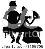 Poster, Art Print Of Silhouetted Couple Sitting On A Bench