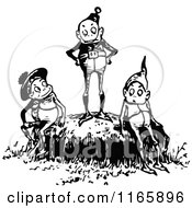 Clipart Of Retro Vintage Black And White Boys On A Rock Royalty Free Vector Illustration