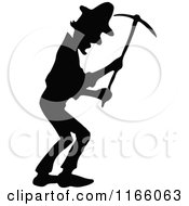 Clipart Of A Silhouetted Man Using A Pickaxe Royalty Free Vector Illustration
