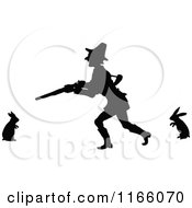 Poster, Art Print Of Silhouetted Man Hunting Rabbits