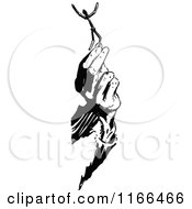 Clipart Of A Retro Vintage Black And White Hand Holding A Match Stick Man Royalty Free Vector Illustration