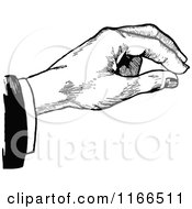 Clipart Of A Retro Vintage Black And White Hand Royalty Free Vector Illustration