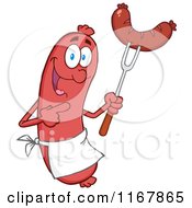 Cartoon Of A Sausage Mascot Pointing To A Weenie On A Fork Royalty Free Vector Clipart