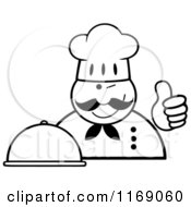 Cartoon Of A Happy Black And White Chef Holding A Cloche Platter And A Thumb Up Royalty Free Vector Clipart