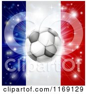 Clipart Of A Soccer Ball Over A France Flag With Fireworks Royalty Free Vector Illustration by AtStockIllustration
