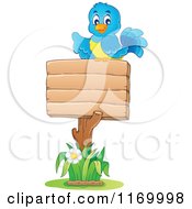 Poster, Art Print Of Happy Bluebird Pointing Over A Wooden Sign