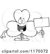 Cartoon Of An Outlined Happy Shamrock Mascot Holding A Sign Royalty Free Vector Clipart