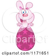 Cartoon Of A Happy Pink Easter Bunny Sitting On A Star Egg Royalty Free Vector Clipart