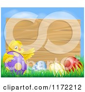 Poster, Art Print Of Wooden Sign With A Chick And Easter Eggs Against Blue Sky