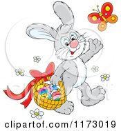 Cartoon Of A Gray Easter Bunny Waving And Carrying Eggs In A Basket Royalty Free Vector Clipart