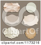 Clipart Of Distressed And Wrinkled Labels On Brown Royalty Free Vector Illustration