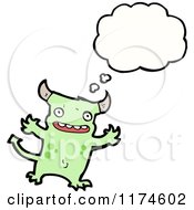 Cartoon Of A Green Horned Monster With A Conversation Bubble Royalty Free Vector Illustration