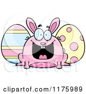 Cartoon Of A Grinning Chubby Easter Bunny With Eggs Royalty Free Vector Clipart
