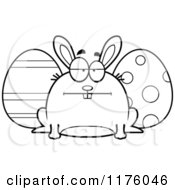 Cartoon Of A Black And White Bored Chubby Easter Bunny With Eggs Royalty Free Vector Clipart