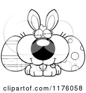 Cartoon Of A Black And White Goofy Easter Bunny With Eggs Royalty Free Vector Clipart