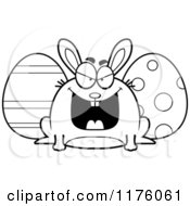 Cartoon Of A Black And White Sly Chubby Easter Bunny With Eggs Royalty Free Vector Clipart