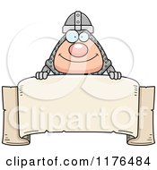 Cartoon Of A Happy Knight Over A Banner Royalty Free Vector Clipart