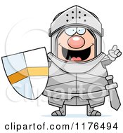 Cartoon Of A Smart Armoured Knight With An Idea Royalty Free Vector Clipart